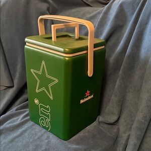 Heineken Green Cooler Box. The lid is a floatable cup holder. Fits 8 bottles